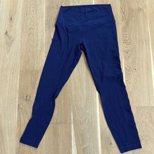 Lululemon leggings blue with imprinted “LULULEMON” on the side, size 8 no tag